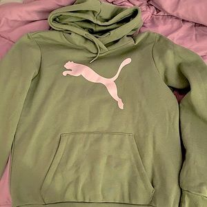 woman’s army green Puma hooded sweatshirt with logo